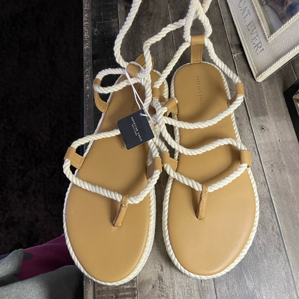 Brand new, with tags. Tie up sandals.